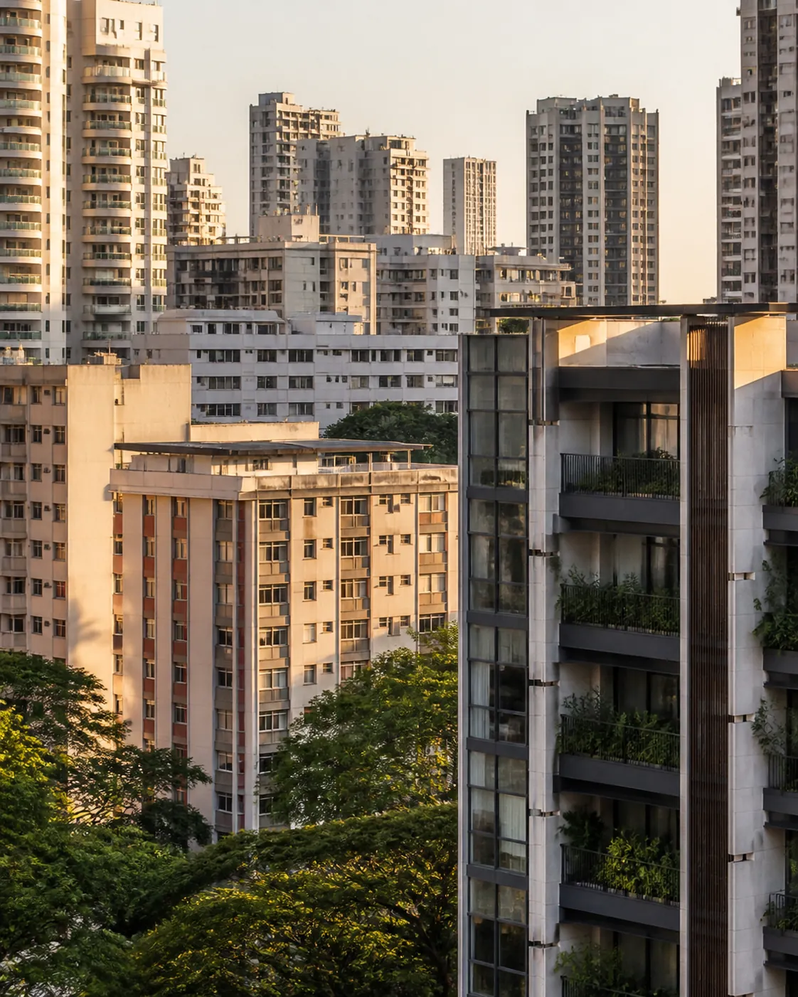 Clusters of residential towers of different eras seen across a dense Singapore city fringe.