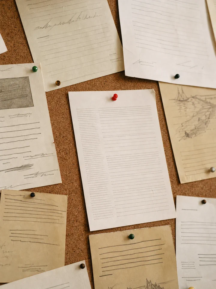 The grant award letter pinned to a noticeboard.
