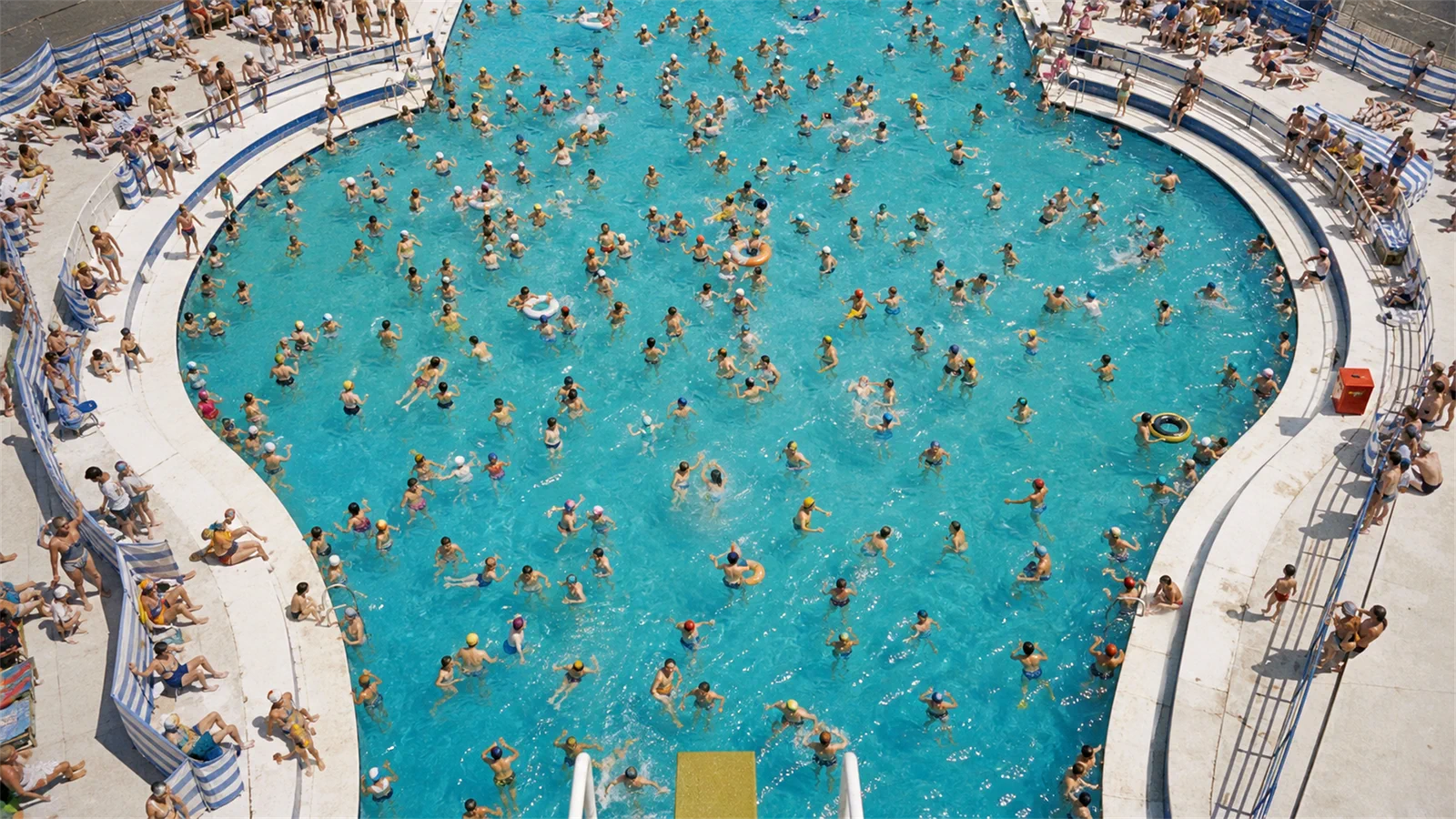 The pool full of swimmers within seconds of opening.